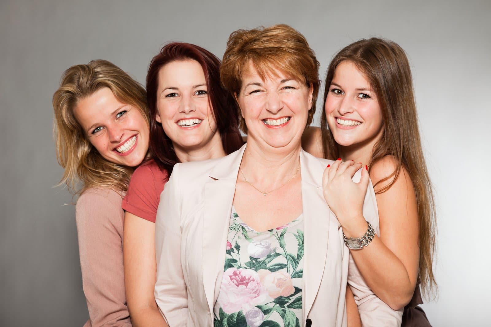 Three generations of women laughing together